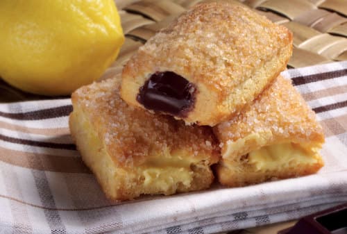 Flauti con cioccolato o crema al limone - Leggera pasta sfoglia, che racchiude al suo interno una deliziosa crema al limone o al cioccolato, per questi squisiti Flauti ricoperti da granella di zucchero.


Peso Netto 1500gr
Scadenza 180gg
Dim. Pallet 80x120cm – 9 cart. per strato
Pallettizzazione max 180 cartoni