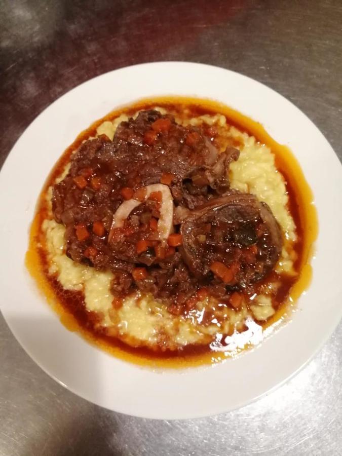 Figura illustrativa Osteria Caffe' San Carlo