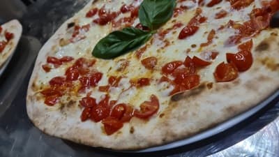 Figura illustrativa Kuuk Pizza