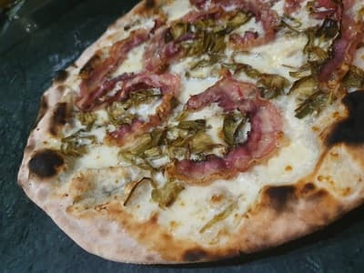 Figura illustrativa Kuuk Pizza