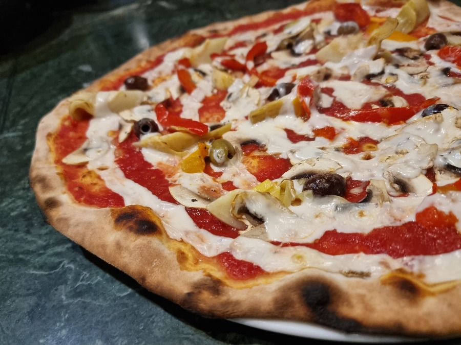 Figura illustrativa Kuuk Pizza