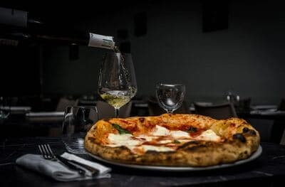 Figura illustrativa Ristorante Pizzeria Prima Classe