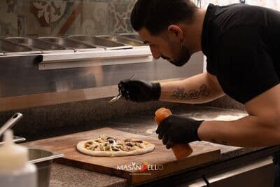 Figura illustrativa Ristorante Pizzeria Masaniello